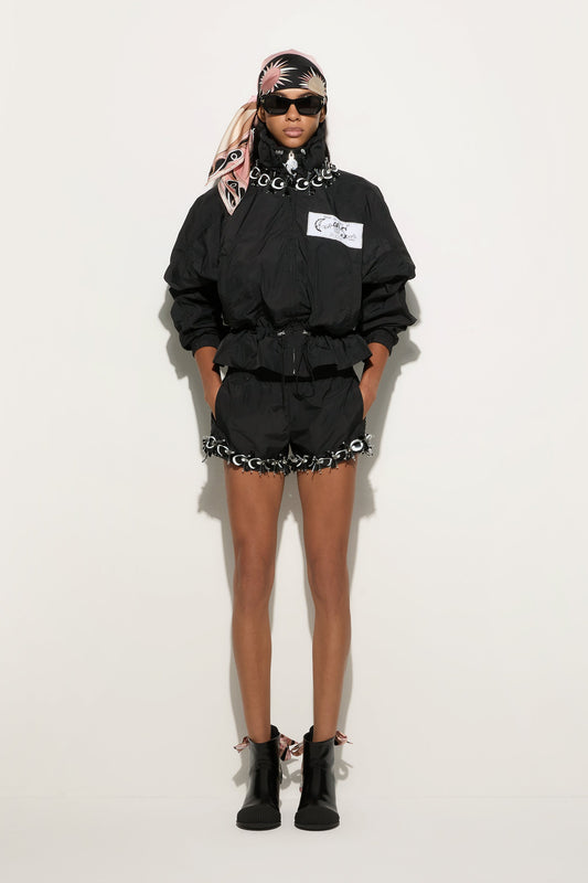 Shorts con Ricami